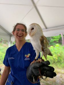 Volunteer Caity with Boogie the barn owl